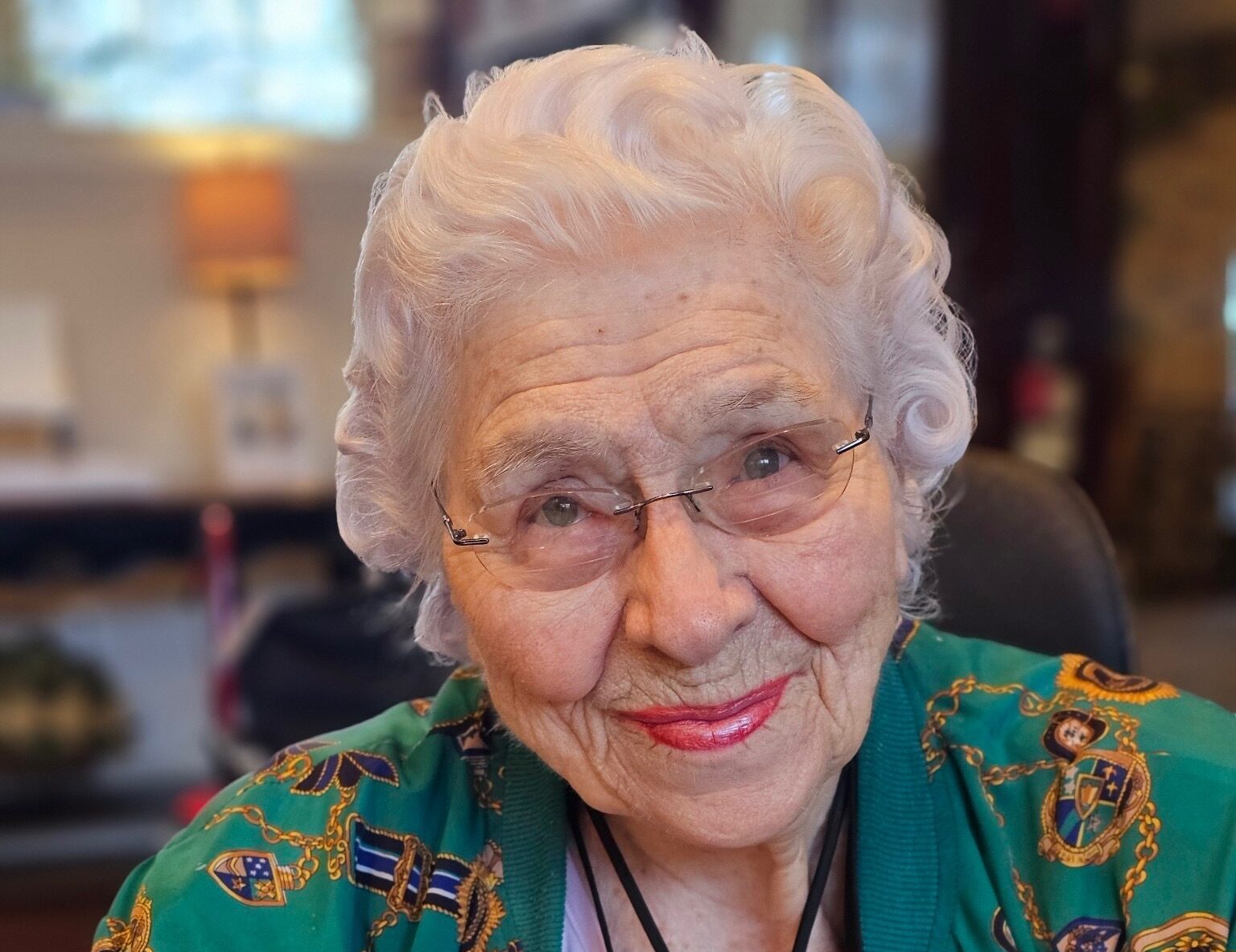 senior resident with a drink